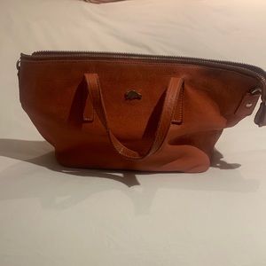 Roots orange leather purse. Excellent quality. Great size!